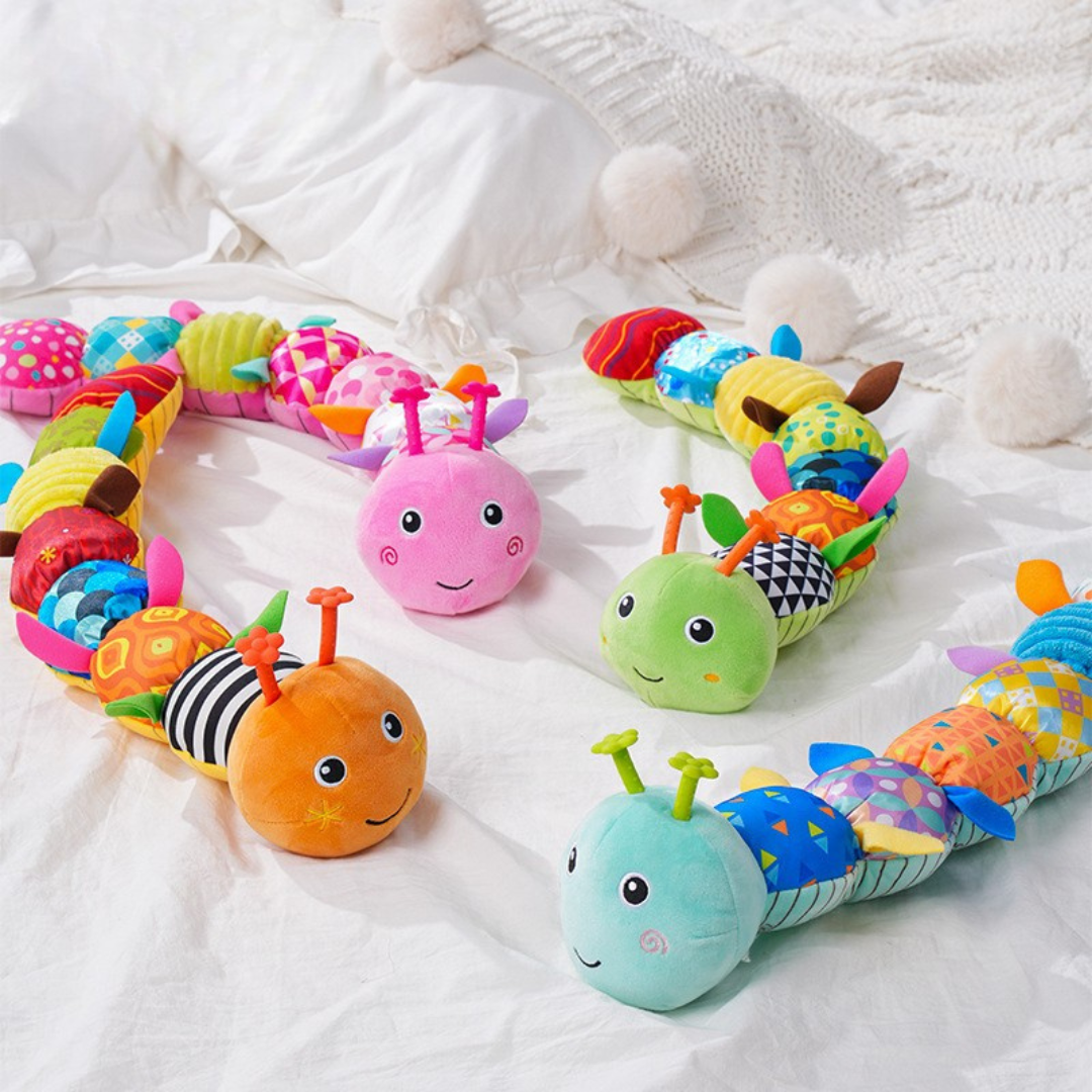 HappyHug™ Rups – Educatief & Speels - Sensorische pluche rammelaar en muziek rups