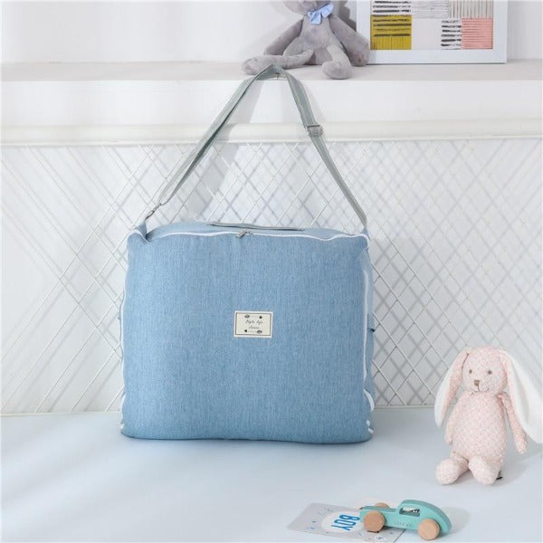 SnugNest™ – Draagbaar Babybed – Zacht, Veilig Comfortabel voor Reizen en Thuis