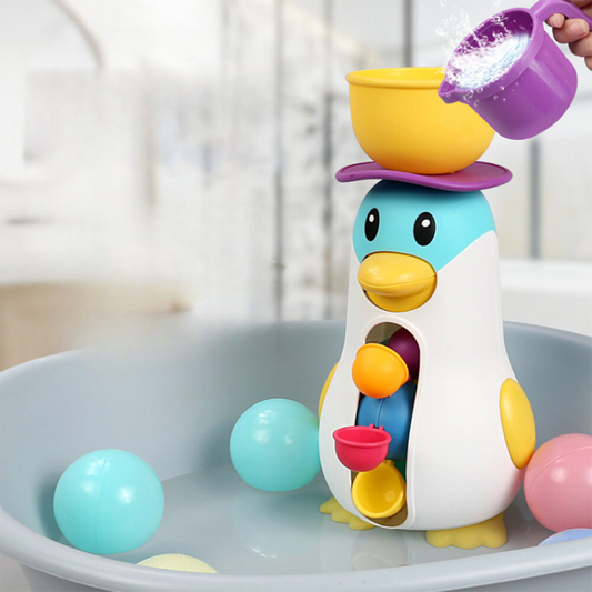 SplashPinguin™ – Badspeeltje met waterrad – Pinguïn speelgoed voor in bad
