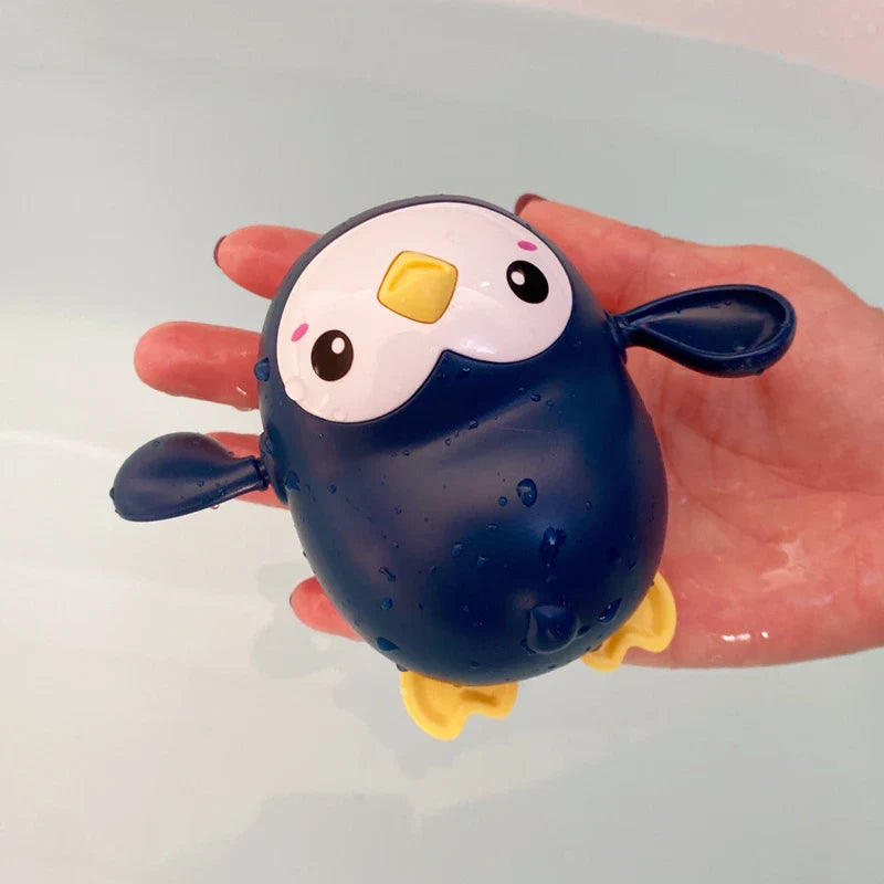 SwimSpinny™ – Opwindbaar Dierenspeeltje voor in Bad – Drijvend Badspeelplezier