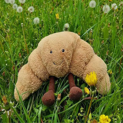 Croissnuggle™ – Lachende croissant knuffel – Pluche knuffel