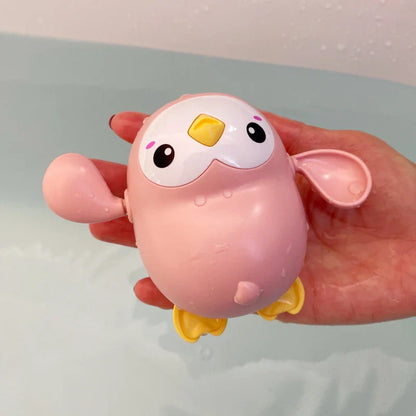 SwimSpinny™ – Opwindbaar Dierenspeeltje voor in Bad – Drijvend Badspeelplezier