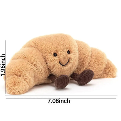 Croissnuggle™ – Lachende croissant knuffel – Pluche knuffel