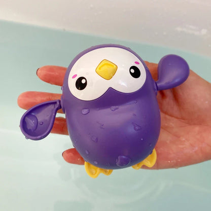 SwimSpinny™ – Opwindbaar Dierenspeeltje voor in Bad – Drijvend Badspeelplezier