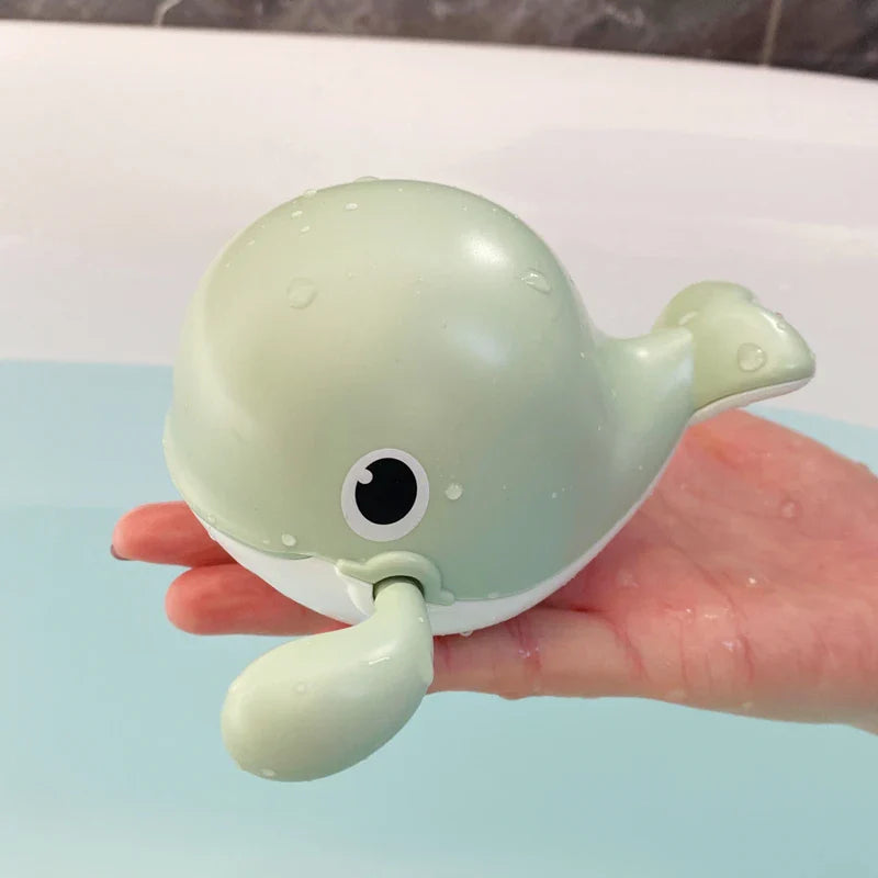 SwimSpinny™ – Opwindbaar Dierenspeeltje voor in Bad – Drijvend Badspeelplezier