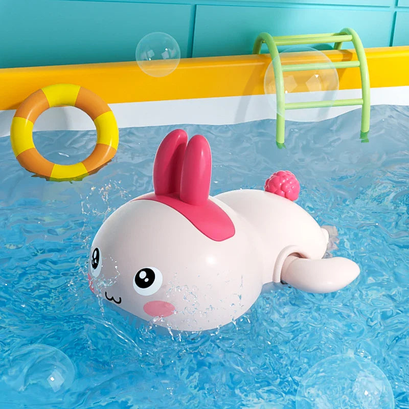 SwimSpinny™ – Opwindbaar Dierenspeeltje voor in Bad – Drijvend Badspeelplezier