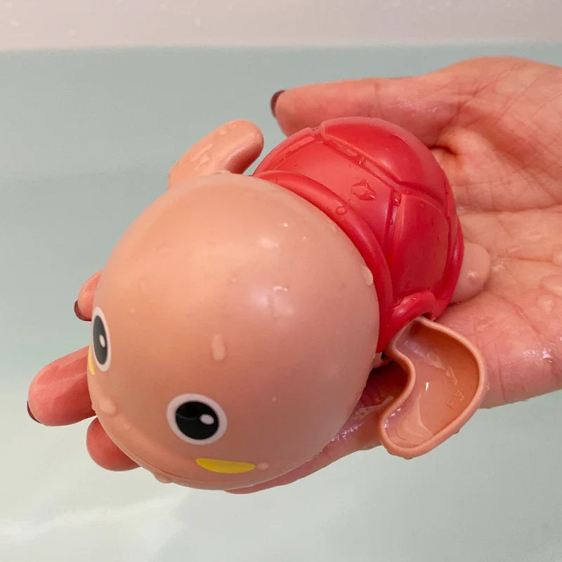 SwimSpinny™ – Opwindbaar Dierenspeeltje voor in Bad – Drijvend Badspeelplezier