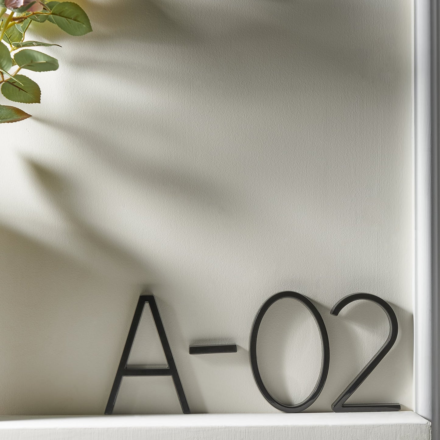 Trilo Huisnummerbord - Zinklegering, Zwevend Design 7