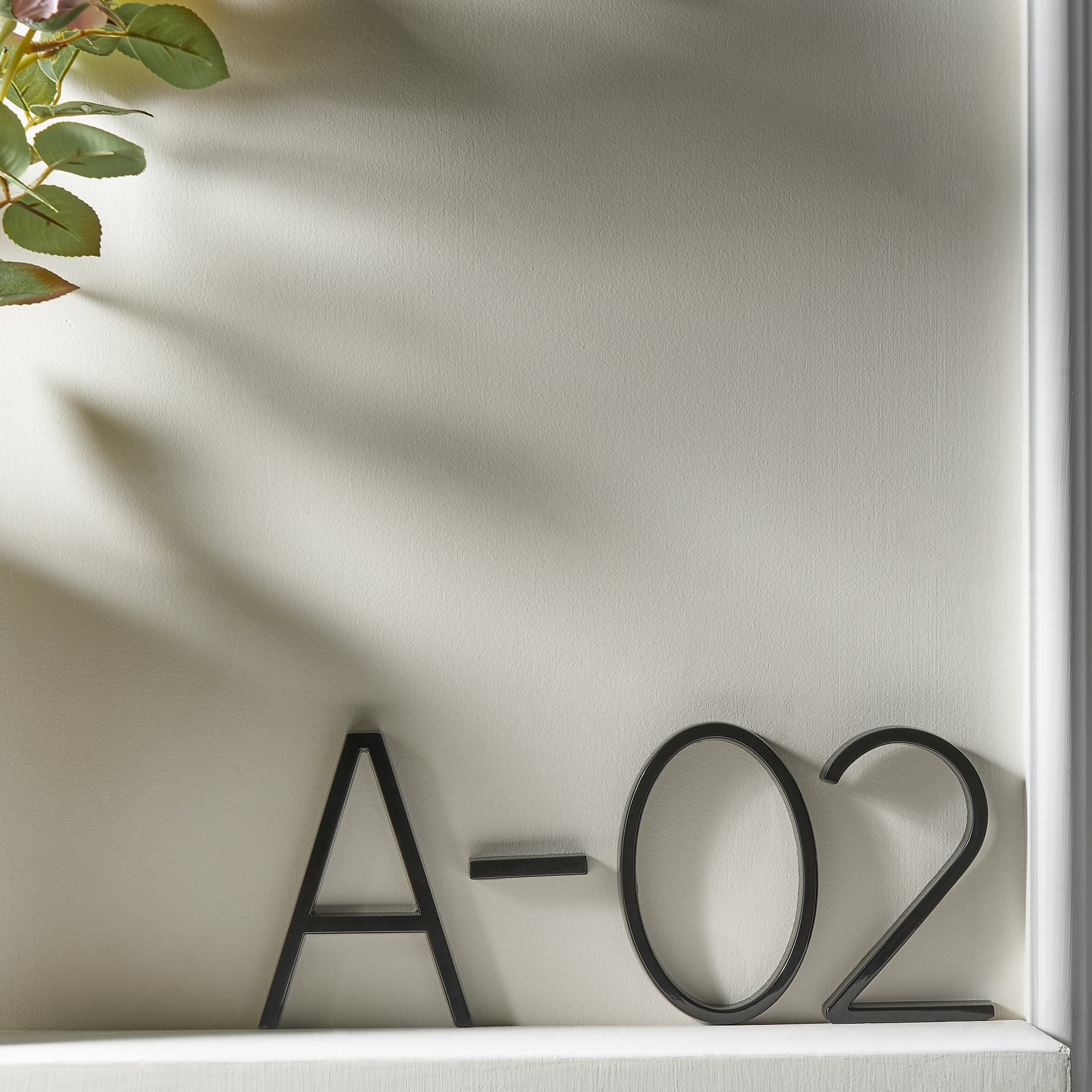 Trilo Huisnummerbord - Zinklegering, Zwevend Design 7