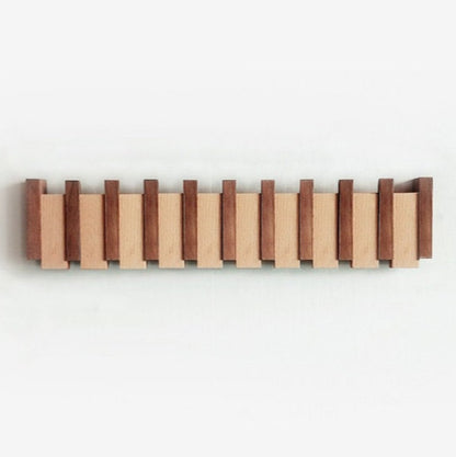MelodyRack™ – Inklapbare Magnetische Kapstok – Piano Wandkapstok Design