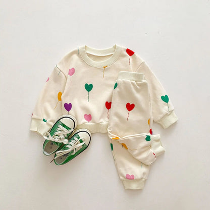 HeartCuddle™ – Zacht Trainingspak met Hartjesprint – Baby Meisjes Outfit