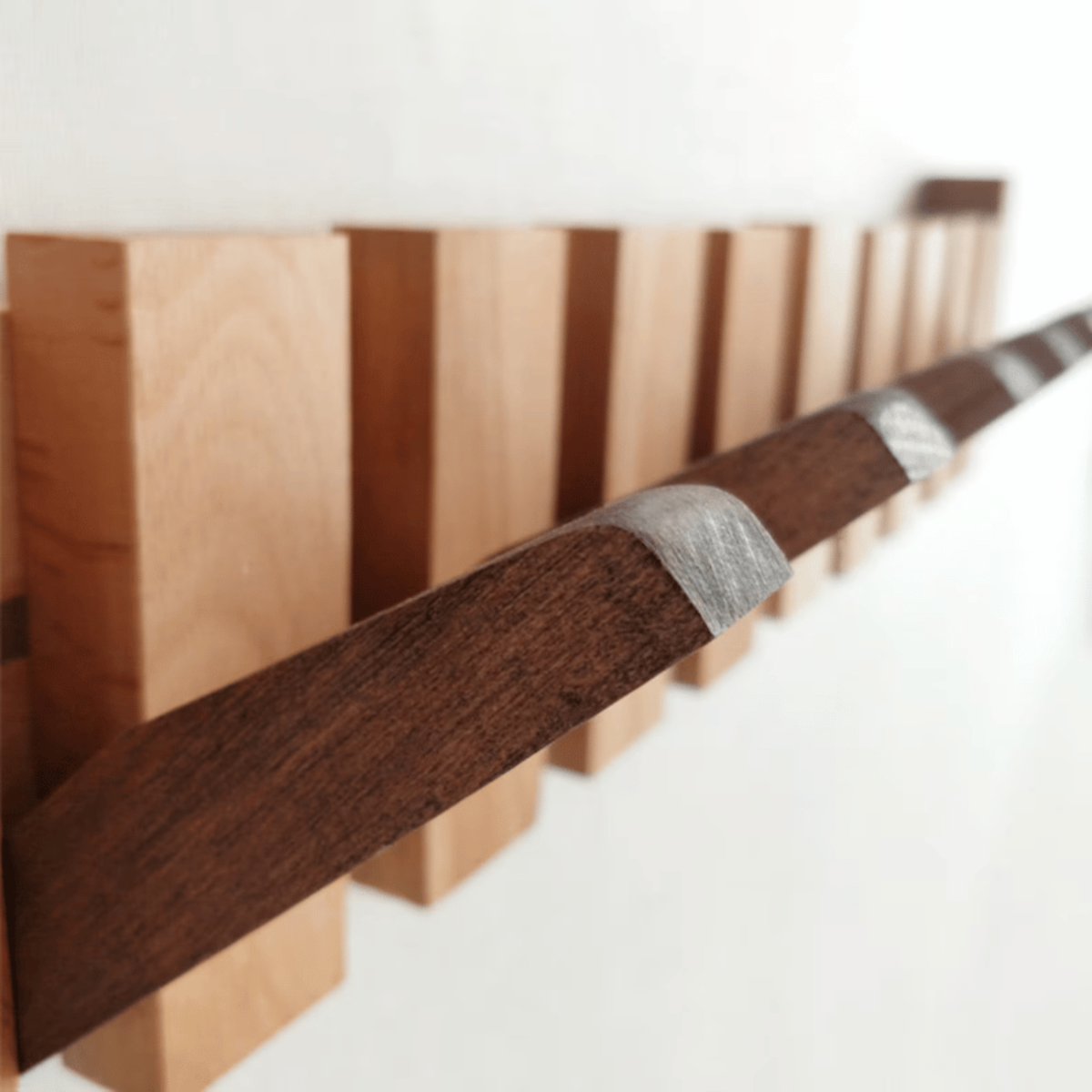 MelodyRack™ – Inklapbare Magnetische Kapstok – Piano Wandkapstok Design
